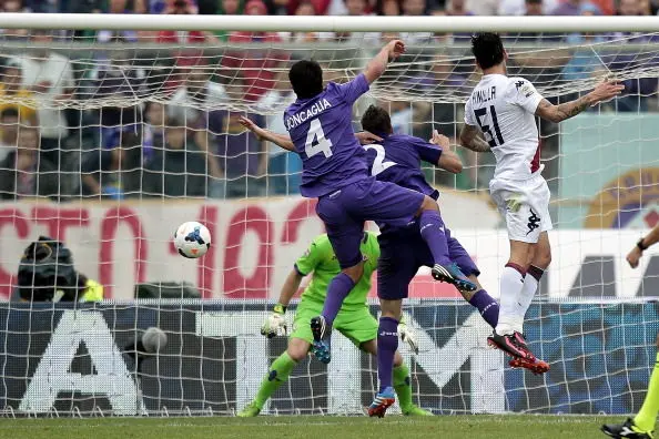 FLORENCE, ITALY - SEPTEMBER 15: Mauricio Pinilla #51 of Cagliari Calcio scores a goal during the Serie A match between ACF Fiorentina and Cagliari Calcio at Stadio Artemio Franchi on September 15, 2013 in Florence, Italy.  (Photo by Gabriele Maltinti/Getty Images)