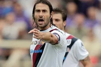 FLORENCE, ITALY - SEPTEMBER 15: Daniele Conti of Cagliari Calcio gestures during the Serie A match between ACF Fiorentina and Cagliari Calcio at Stadio Artemio Franchi on September 15, 2013 in Florence, Italy.  (Photo by Gabriele Maltinti/Getty Images)