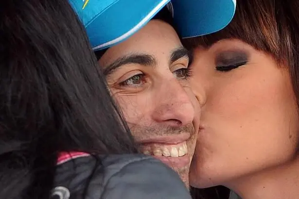 Italian rider Fabio Aru of the Astana Pro team icelebrates on the podium following his winning in the 20th stage of the 98th Giro d\\'Italia cycling tour over199 km from Saint-Vincent to Sestrieres, 29 May 2015. ANSA/DANIEL DAL  ZENNARO