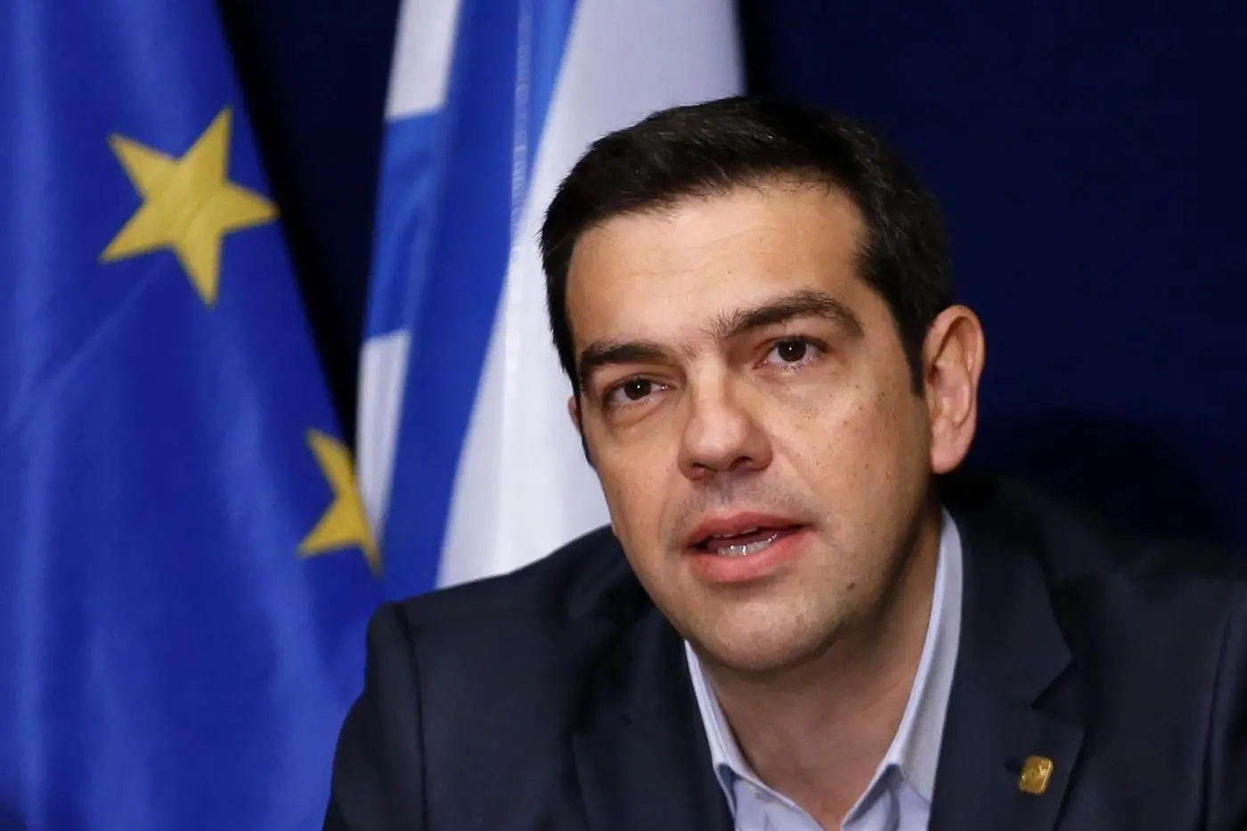 Greek Prime Minister Alexis Tsipras addresses a news conference after a European Union leaders summit in Brussels February 12, 2015. Tsipras said on Thursday his goal was a transition to a new financing programme and that he had made progress at his first European Union summit. Picture taken February 12, 2015.      REUTERS/Francois Lenoir (BELGIUM - Tags: POLITICS BUSINESS HEADSHOT)