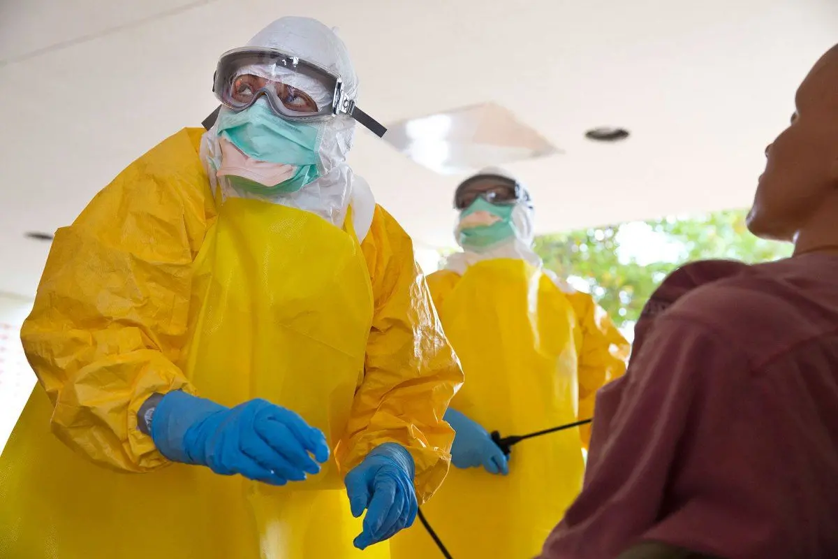 Licensed clinician Hala Fawal practices drawing blood from a patient using a dummy on Monday, Oct. 6, 2014, in Anniston, Ala. The Centers for Disease Control and Prevention (CDC) has developed an introductory training course for licensed clinicians. According to the CDC, the course is to ensure that clinicians intending to provide medical care to patients with Ebola have sufficient knowledge of the disease. (AP Photo/Brynn Anderson)