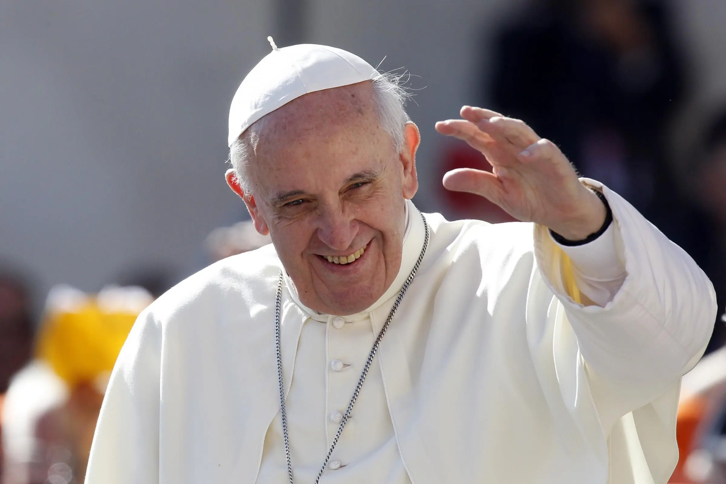 Pope Francis waves to faithful as he arrives for his weekly general audience in St. Peter\\'s Square at the Vatican, Wednesday, Sept. 18, 2013. (AP Photo/Riccardo De Luca)