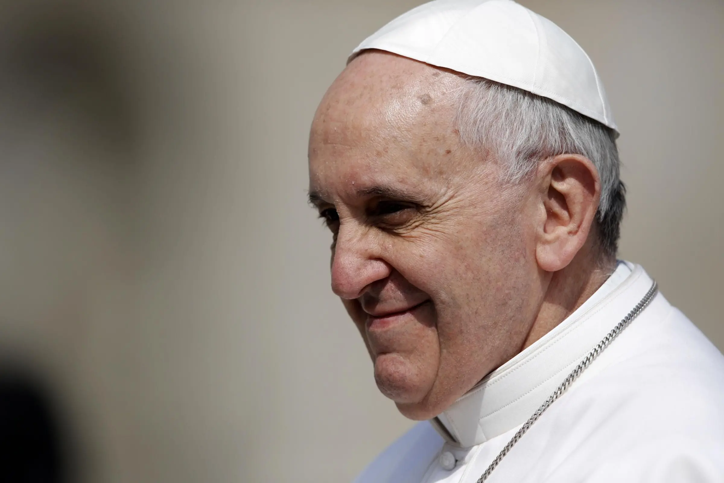 Pope Francis is driven through the crowd during his general audience, in St. Peter\\'s Square, at the Vatican, Wednesday, March 27, 2013. (AP Photo/Andrew Medichini)