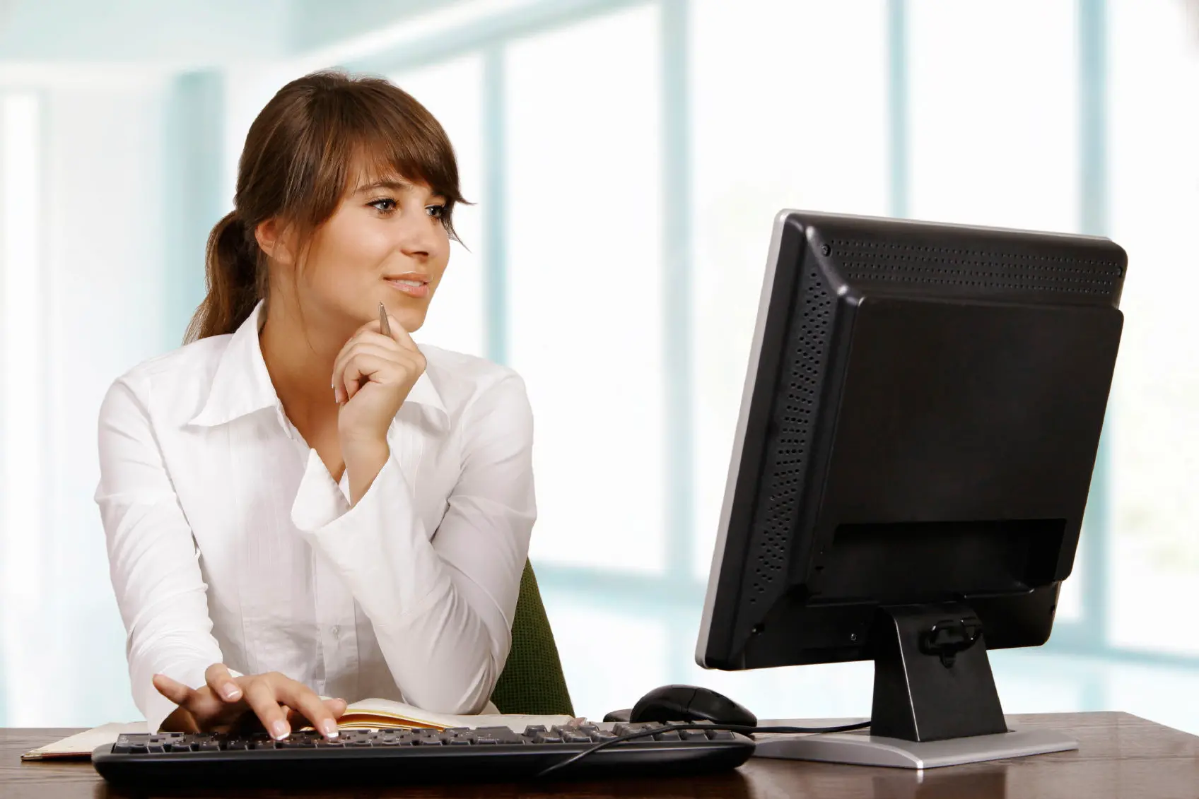Young woman working with computer