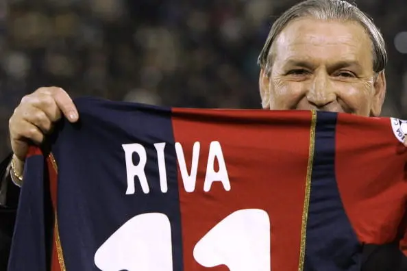 CAGLIARI, ITALY:  Italian football legend Gigi Riva shows the Cagliari\\'s shirt, before the friendly football match Italy/Russia at Sant Elia stadium in Cagliari, 09 February 2005. Gigi Riva is the Azzurri\\'s record goalscorer and considered by many to be the country\\'s best ever striker. AFP PHOTO/ Carlo BARONCINI  (Photo credit should read CARLO BARONCINI/AFP/Getty Images)