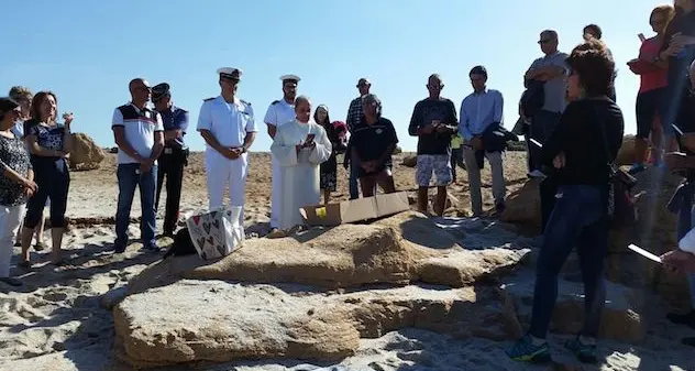 Benedizione della statua della Madonna sul fondale di Is Arutas