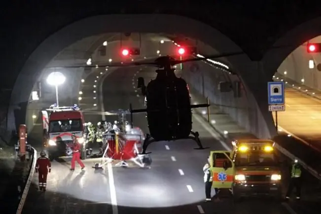 REFILE - UPDATING CAPTION INFORMATION \\r\\nA helicopter takes off from the entrance of a tunnel into which a foreign coach crashed in Sierre, western Switzerland early March 14, 2012. The bus carrying Belgian tourists crashed into the wall of the tunnel in Switzerland, killing 28 people, 22 of them children, police said on Wednesday.   REUTERS/Denis Balibouse (SWITZERLAND - Tags: DISASTER TRANSPORT TPX IMAGES OF THE DAY)