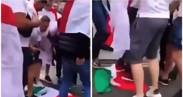 Tifosi inglesi sputano e calpestano la bandiera dell'Italia davanti a Wembley