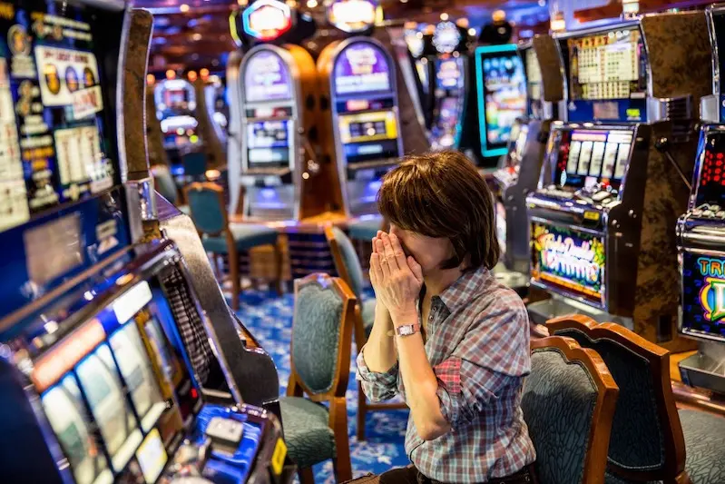 E14936 United Arab Emirates,  Dubai, Cruise ship Costa Fortuna, company from Italy. Gambling hall. Woman wins with slot machine