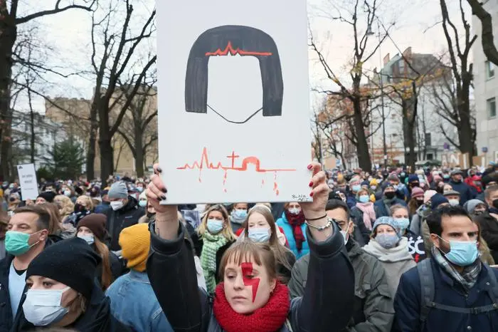 epa09567997 People take part in a protest under the slogan \\'Not one more\\' in Warsaw, Poland, 06 November 2011. Protests against the new abortion law, which banned terminations in cases of foetal defects, sparked all over the country under the slogan \\'Not one more\\', after the death of septic shock of a 30-year-old pregnant woman from Pszczyna.  EPA/LESZEK SZYMANSKI POLAND OUT