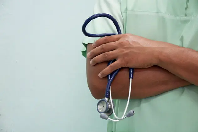 Close up unknow nurse in green uniform.