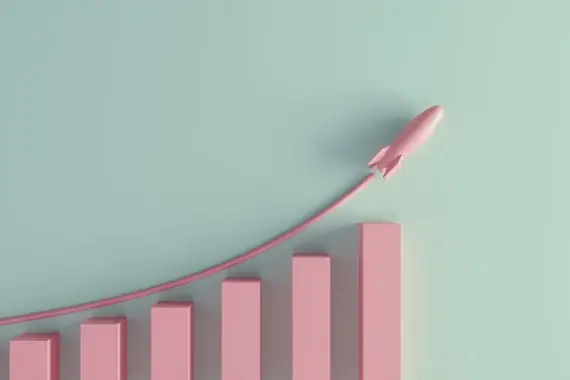 A pastel colored growing graph with rising rocket. (3d render)