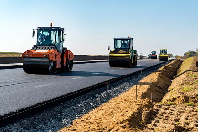 Road rollers building the new asphalt road