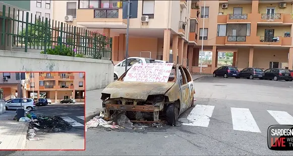 L’auto-carcassa bruciata e piena di topi? Sparita, ‘vincono’ anche stavolta i residenti