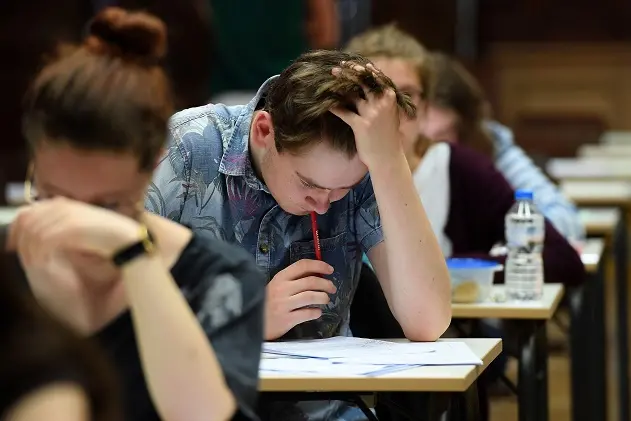 High school students take the philosophy exam, the first test session of the 2017 baccalaureate (high school graduation exam) on June 15, 2017 at the Fustel de Coulanges high school in Strasbourg, eastern France. \\n\\nA total of 520.000 Students of general and technological graduating classes  are registered to take their written baccalaureat exams at over 4 400 examination centres across France between June 15-June 22, 2017. / AFP PHOTO / FREDERICK FLORIN        (Photo credit should read FREDERICK FLORIN/AFP/Getty Images)