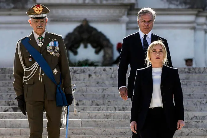 Italian Prime Minister Giorgia Meloni places a laurel wreath at the chapel of the Unknown Soldier at the Altare della Patria, on the 101st anniversary of the departure for Rome from Aquileia of the train that contained his remains, in Rome, Italy, 29 October 2022. ANSA / ANGELO CARCONI