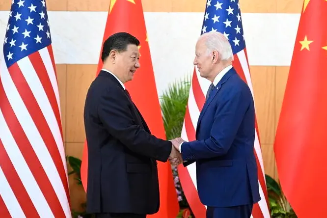 epa10305492 Chinese President Xi Jinping (L) greets his US counterpart Joe Biden before their meeting, one day ahead of the G20 Summit in Bali, Indonesia, 14 November 2022. The 17th Group of Twenty (G20) Heads of State and Government Summit will be held in Bali from 15 to 16 November 2022.  EPA/XINHUA /LI XUEREN CHINA OUT / MANDATORY CREDIT  EDITORIAL USE ONLY