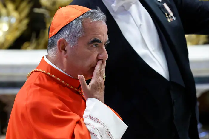 Cardinal Angelo Becciu during a consistory ceremony in the Saint Peter\\'s basilica at the Vatican, 27 August 2022.\\nANSA/FABIO FRUSTACI