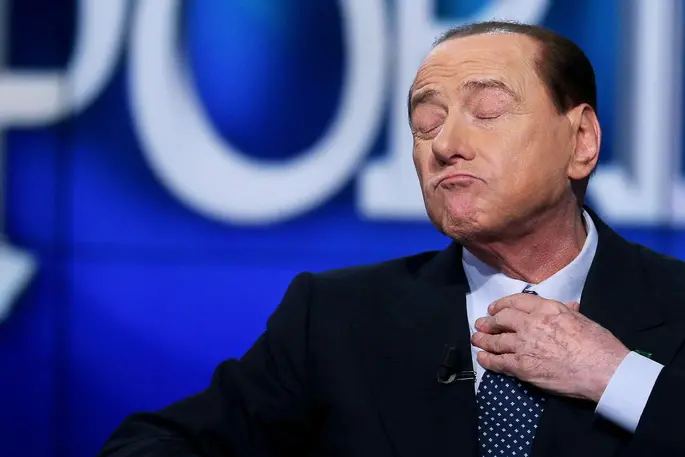 epa09093316 (FILE) Former Italian prime minister Silvio Berlusconi adjusting his tie as he appears on \\'Porta a Porta\\' TV show on Rai 1 in Rome, Italy, 21 May 2014 (reissued 24 March 2021). Forza Italia party leader Silvio Berlusconi has been admitted to a Milan hospital since 22 March 2021 with \\'health problems\\', his lawyer said on 24 March 2021.  EPA/ALESSANDRO DI MEO