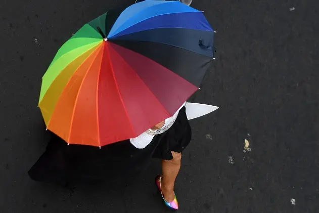 TOPSHOT - A reveller takes part in the Gay Pride Parade in San Salvador, on June 24, 2017.   / AFP PHOTO / Marvin RECINOS        (Photo credit should read MARVIN RECINOS/AFP/Getty Images)