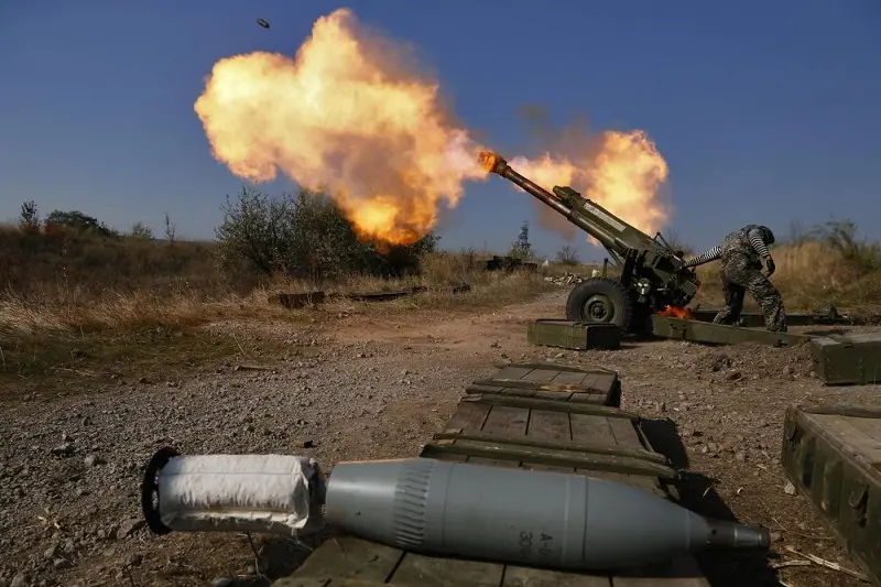 Pro-Russian rebels fire artillery toward Ukrainian position at Donetsk Sergey Prokofiev International Airport outskirts the city of Donetsk, eastern Ukraine Tuesday, Oct. 14, 2014. (AP Photo/Dmitry Lovetsky)