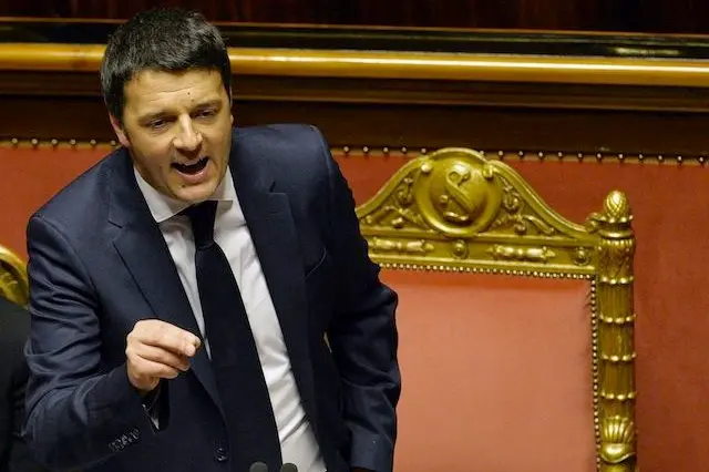 Newly appointed Italian Prime Minister Matteo Renzi gestures during a debate for a confidence vote at the Italian Senate  on February 24, 2014 in Rome.Matteo Renzi was to unveil details of his ambitious government programme on Monday as he faced a confidence vote in parliament in a key test of his power to unite warring factions and secure a solid majority. The new premier is expected to present plans for rapidly overhauling the tax system, job market and public administration in his speech to the Senate, which will put his newly-formed cabinet to a confidence vote.    AFP PHOTO / ANDREAS SOLARO        (Photo credit should read ANDREAS SOLARO/AFP/Getty Images)