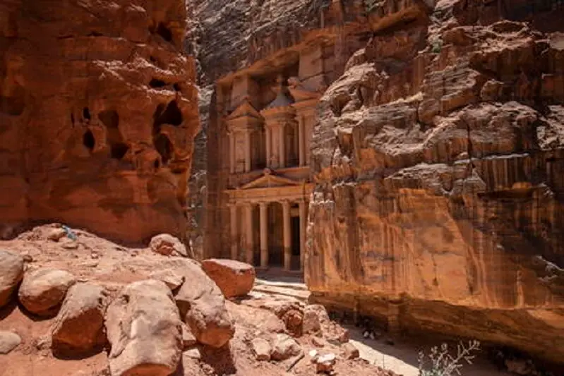 epa08498828 A view of the Treasury building at the reopened Petra archeological site, in Petra, some 280 km south of Amman, Jordan, 20 June 2020. Petra archeological site is one of the landmarks of Jordan tourism sector, the former Nabatean capital which dates back to about 200 BC, attracted in 2019, according to official figures, about 1,13 million visitors from all over the world. Following the start of the COVID-19 coronavirus pandemic in Jordan, the last tourist left Petra on 16 March. Since then its some 200 guides, 1,500 horse and donkey owners, hotels, restaurant and tourist stalls workers stayed without a fixed revenue. As Jordan tourism sites have officially reopened to domestic tourism on 16 June, locals flocked on 20 June to visit Petra in quiet surroundings without the big tourist buses.  EPA/ANDRE PAIN