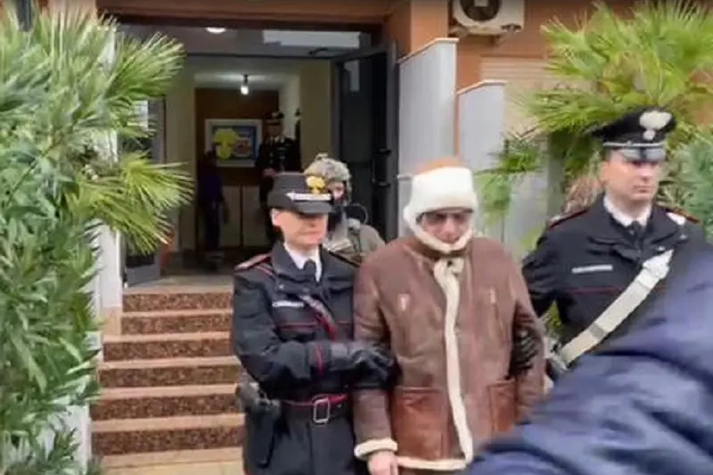 A handout photo made available by Italy\\'s Carabinieri shows a video frame of the Mafia boss Matteo Messina Denaro (C), Italy\\'s most wanted man, being arrested in Palermo, Sicily, by the Carabinieri police\\'s ROS unit after 30 years on the run  in Palermo, Sicily island, Italy, 16 January 2023.\\nANSA/US CARABINIERI +++ NO SALES, EDITORIAL USE ONLY +++ NPK +++