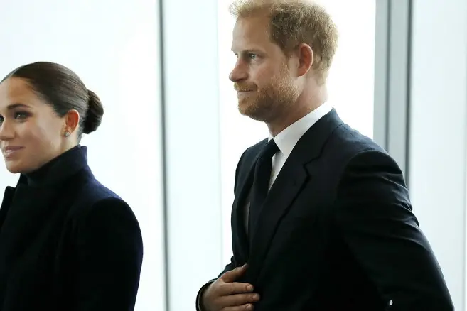 Britain\\'s Prince Harry, Duke of Sussex (C) and his wife Meghan, Duchess of Sussex exit after posing for photographers at the World Trade Center in New York, New York, USA, 23 September 2021. ANSA/PETER FOLEY