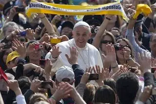 Pope Francis arrives for his weekly general audience in St. Peter square at the Vatican, Wednesday, April 17, 2013. (AP Photo/Alessandra Tarantino)