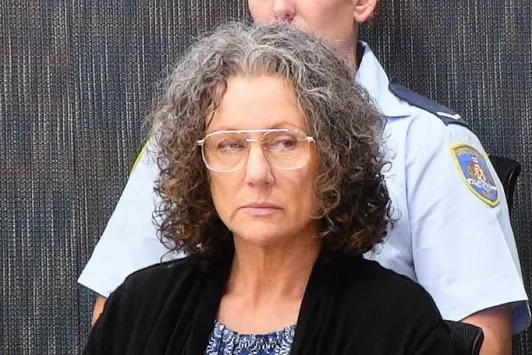 Kathleen Folbigg appears on a video link screened a the NSW Coroners Court, Sydney, Monday, April 2019, 2019. An Inquiry continues into convictions of \"baby killer\" Kathleen Megan Folbigg. (AAP Image/Peter Rae) NO ARCHIVING