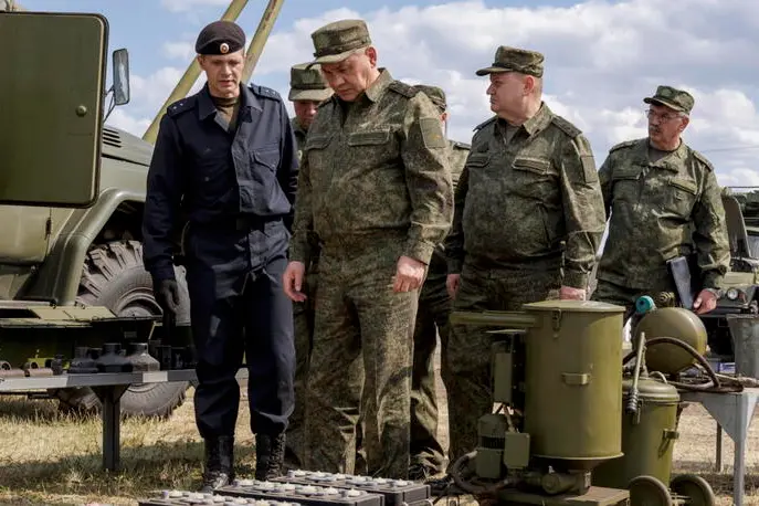 epa10696474 A handout photo made available by the Russian Defence Ministry\\u2019s press-service shows Russian Defence Minister, General of the Army Sergei Shoigu (C), visiting the arsenals and storage base to check the preparation of equipment and weapons to be shipped to the area of the special military operation, in the Omsk region, Russia, 17 June 2023. The head of the Main Armored Directorate of the Russian Ministry of Defense, reported to Shoigu that all armored vehicles had been modified to meet security requirements, the equipment had already been loaded onto railway platforms and was ready to be sent to the troops.\\u2019In the near future, it is planned to send an additional 700 pieces of artillery weapons,\\u2019 the Russian Defense Ministry noted.  EPA/RUSSIAN DEFENCE MINISTRY PRESS SERVICE/HANDOUT HANDOUT HANDOUT EDITORIAL USE ONLY/NO SALES HANDOUT EDITORIAL USE ONLY/NO SALES