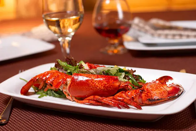 lobster with salad and tomato cherry