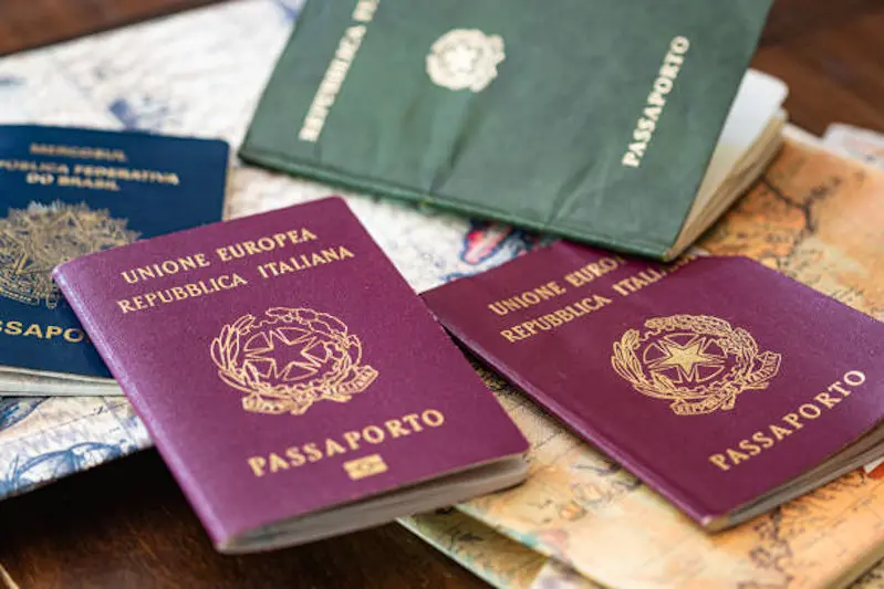 Brazilian and Italian passports on an ancient map of South America ready for the tour. Holidays concept.Horizontal view