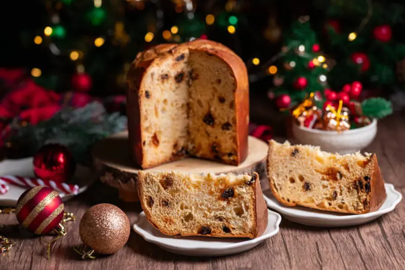 Traditional Italian Christmas cake Panettone with festive decorations