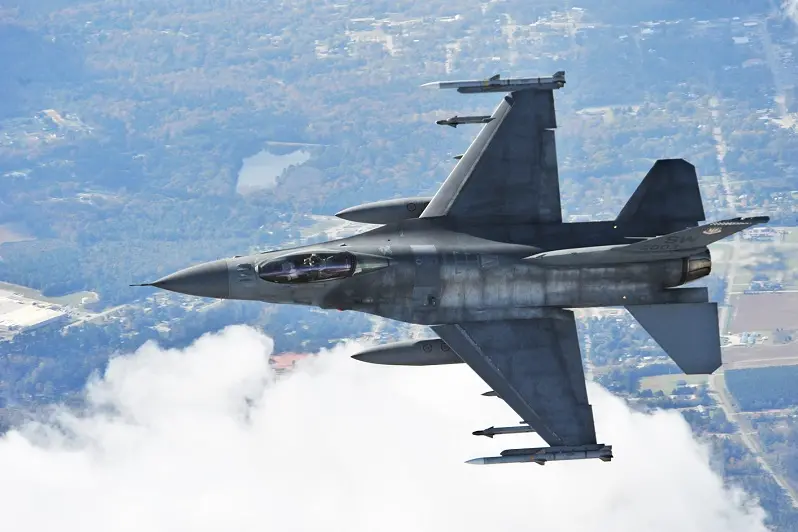 Capt. Matthew Feeman in an F-16 Fighting Falcon approaches a Cessna airplane, flown by South Carolina\\'s Civil Air Patrol, to initiate a \"head butt\" as part of exercise Fertile Keynote Nov. 19, 2009 above South Carolina. A head butt is an action taken by the intercepting aircraft to redirect the intruder in the appropriate direction after other communications, like radio contact, have failed. Captain Feeman is an F-16 alert pilot from the 55th Fighter Squadron (U.S. Air Force photo/Senior Airman Michael Cowley)