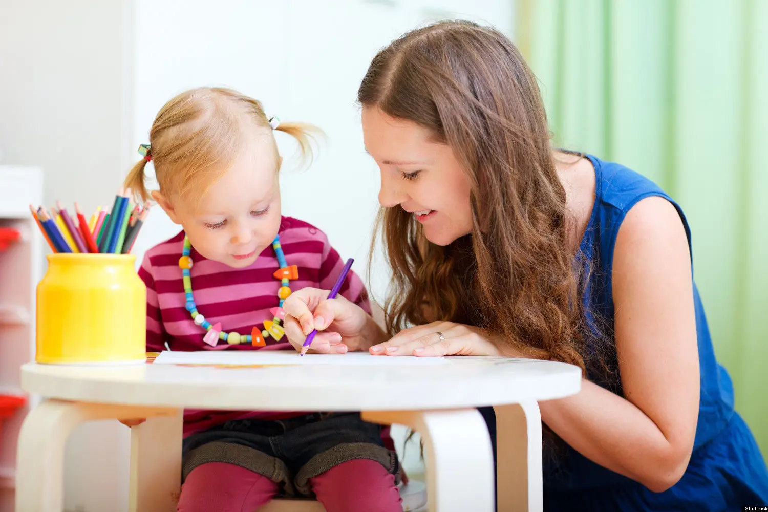 Young mother and her little daughter drawing together; Shutterstock ID 61699324; PO: The Huffington Post; Job: The Huffington Post; Client: The Huffington Post; Other: The Huffington Post