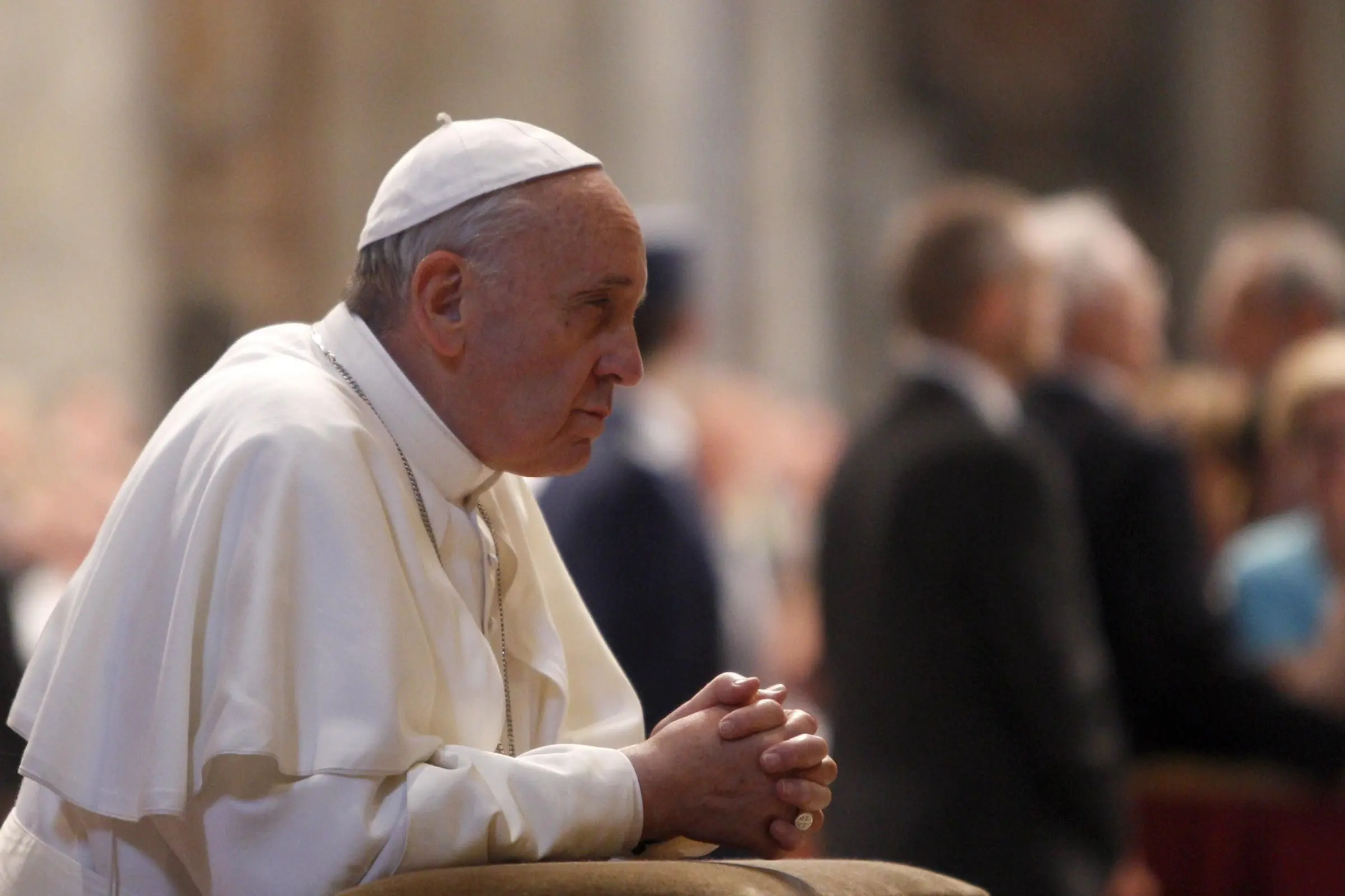 Pope Francis prays in front of the tomb of Pope John XXIII at the end of a mass on the 50th anniversary of his death, in St. Peter\\'s Basilica at the Vatican, Monday, June 3, 2013. (AP Photo/Riccardo De Luca)
