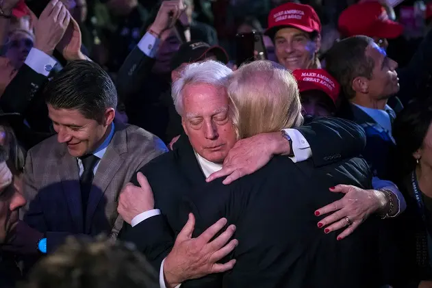 NEW YORK, NY - NOVEMBER 9: President-elect Donald Trump hugs his brother Robert Trump in the crowd after speaking during an election rally in midtown in New York, NY on Wednesday November 09, 2016. (Photo by Jabin Botsford/The Washington Post via Getty Images)