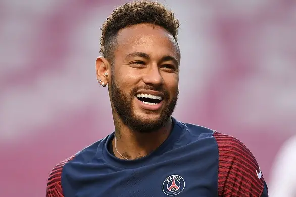 Paris Saint-Germain\\'s Brazilian forward Neymar laughs during a training session at the Luz stadium in Lisbon on August 22, 2020 on the eve of the UEFA Champions League final football match between Paris Saint-Germain and Bayern Munich. (Photo by David Ramos / various sources / AFP) (Photo by DAVID RAMOS/AFP via Getty Images)