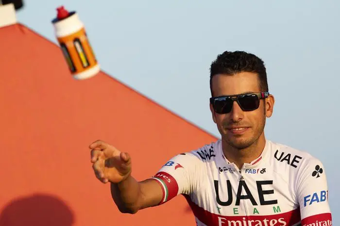 epa07786526 Italian rider Fabio Aru of the UAE Team Emirates attends the presentation of the participants of the La Vuelta cycling race, in Moraria, eastern Spain, 22 August 2019. The La Vuelta 2019 will start on 24 August 2019.  EPA/JAVIER LIZON