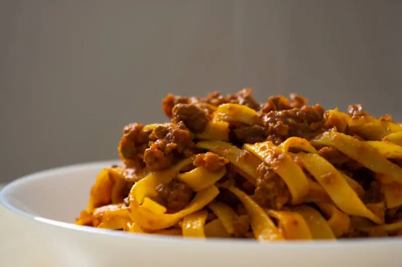 Pasta bolognese. Tagliatelle with bolognese sauce. Fettuccine with meat sauce. Tomato sauce and minced meat. Pasta with rag\\u00F9, typical Italian food.