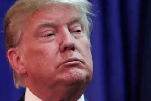 BIRCH RUN, MI - AUGUST 11:  Republican presidential candidate Donald Trump speaks at a press conference before delivering the keynote address at the Genesee and Saginaw Republican Party Lincoln Day Event August 11, 2015 in Birch Run, Michigan. This is Trump\\'s first campaign event since his Republican debate last week. (Photo by Bill Pugliano/Getty Images)