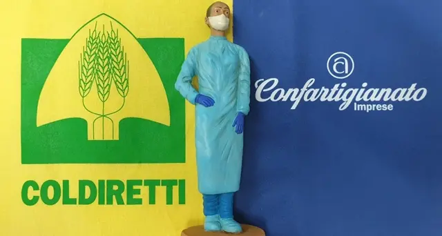 Covid, infermiera con la mascherina: il dono ai vescovi sardi di Coldiretti e ConfArtigianato