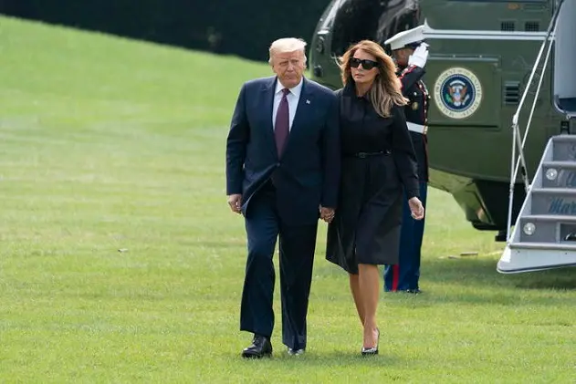 epa08714425 (FILE) - US President Donald J. Trump (L) and First lady Melania Trump (R) return to the White House, in Washington, DC, USA, on 11 September 2020 (reissued 02 October 2020). According to media reports, US President Donald Trump and First Lady Melania Trump have positive for the SARS-CoV-2 coronavirus. US Presidential Councelor Hope Hicks has also tested positive for the virus.  EPA/Chris Kleponis / POOL