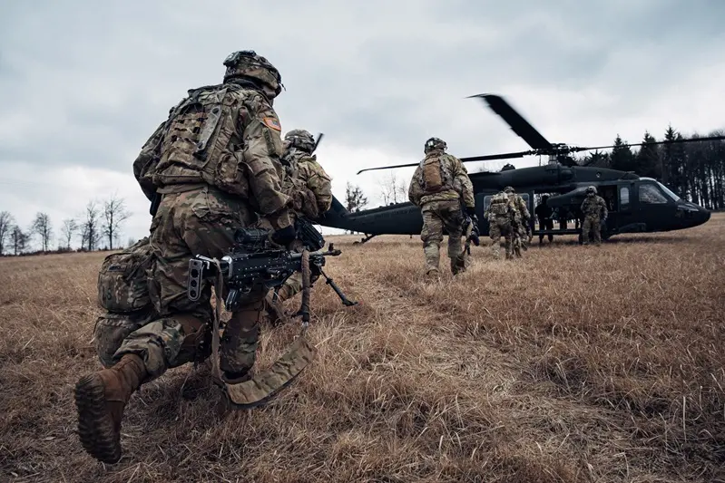 U.S. Soldiers assigned to the 2nd Cavalry Regiment conduct a simulated air assault mission during Saber Strike 22 at Military Training Area Lest, Slovakia, March 5, 2022. Saber Strike 22 is a multinational exercise from Feb. 28 through March 18, 2022, which includes participation from 13 NATO allied and partner nations. The exercise is designed to show NATO\\'s collective capabilities to operate under austere conditions and demonstrate that we are stronger together. (U.S. Army photo by Staff Sgt. Jose H. Rodriguez)