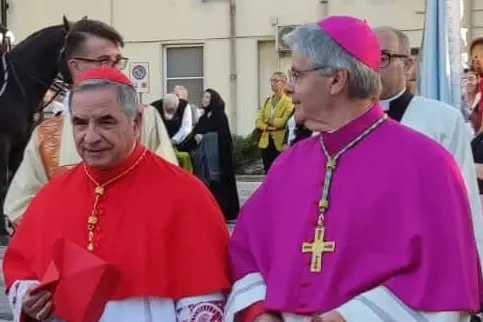 <p>Il cardinale Giovanni Angelo Becciu con Don corrado melis, Vescovo di Ozieri</p>\\n